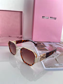 Óculos Miu Miu Onça Luxe Iconic
